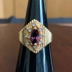 Gold tone purple stone ring size 8.5